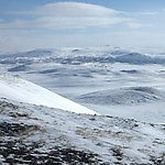 dsc02964: 
The south-east view from Djuptjørnhovda 1375 above Embretsstølen. Ustevatn is the water 
on the picture, and the highest peak in the picture center is Ustetind 1376.
